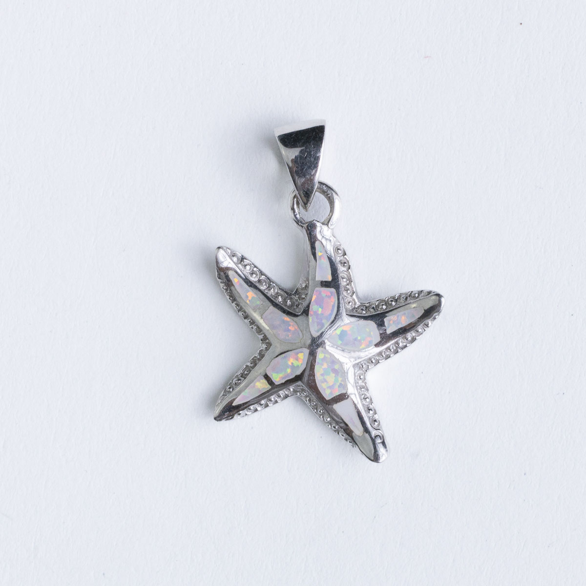 Srebrni privjesak “Morska zvijezda sa svijetlim opalom” Srebrni privjesak “Morska zvijezda sa svijetlim opalom”